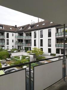 a view of an apartment building from a balcony at Downtown Residence Düsseldorf in Düsseldorf
