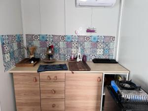 Kuchyňa alebo kuchynka v ubytovaní Tiny House am Neusiedlersee
