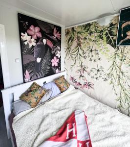 Posteľ alebo postele v izbe v ubytovaní Tiny House am Neusiedlersee