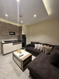 Η κουζίνα ή μικρή κουζίνα στο Chic Apartments For Rent ave1-2