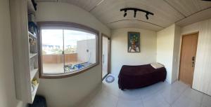 Posezení v ubytování Flat com AR e vista Espetacular na área central de GV-Garagem-wifi-Varandão