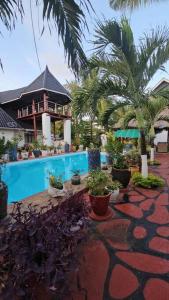 Bazen u ili blizu objekta Shanzu Oasis Pool- WiFi 5 mins from beach