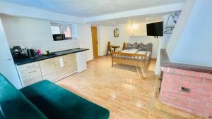 Kuchyň nebo kuchyňský kout v ubytování Orličky Apartments