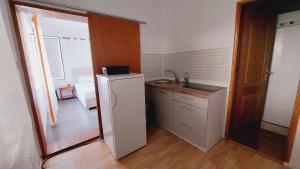 A cozinha ou kitchenette de Guesthouse Mixe
