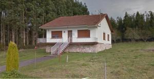 a small house on a hill in a field at Casa Herbellas in Cedeira +37 photos