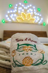 Postel nebo postele na pokoji v ubytování Terra d'amuri Rooms