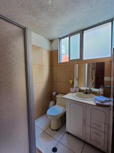 Koupelna v ubytování Edificio Foch