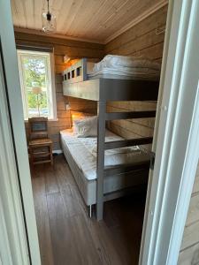 Voodi või voodid majutusasutuse Alpstigen 10A - Newly built sports lodge with amazing views toas