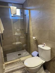 Koupelna v ubytování Hotel Alegret + 37 fotografií