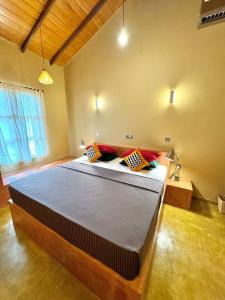 Postel nebo postele na pokoji v ubytování Art Yala Boutique Resort