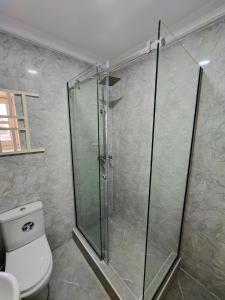 Koupelna v ubytování Lekki Continental Apartment