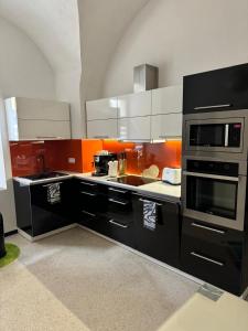 Kuchyň nebo kuchyňský kout v ubytování Apartman I Ubytovani v centru Jihlavy