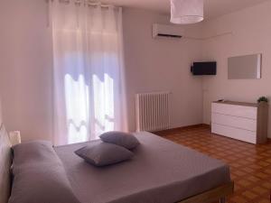 TV i/ili multimedijalni sistem u objektu Affittacamere da Anna