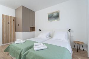 Ένα ή περισσότερα κρεβάτια σε δωμάτιο στο Villa Osinium +33 φωτογραφίες