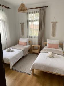 En eller flere senge i et værelse på Luxury Villa with Pool in Sapanca Sofhan Kırkpınar