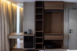 Postel nebo postele na pokoji v ubytování BOLT Boutique Hotel