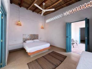 Postel nebo postele na pokoji v ubytování Casa Jardín de San Miguel