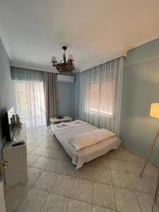 Postel nebo postele na pokoji v ubytování Fanìs House