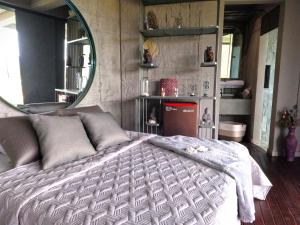 Voodi või voodid majutusasutuse EleMYNT LifeStyle Hotel toas