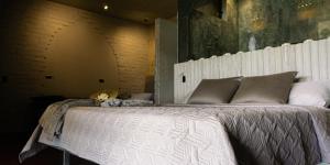 Voodi või voodid majutusasutuse EleMYNT LifeStyle Hotel toas