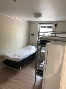Letto o letti in una camera di Rum mitt stan