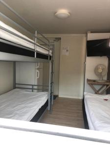 Letto o letti in una camera di Rum mitt stan