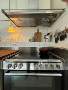 Kuchyň nebo kuchyňský kout v ubytování WS77 B&B Apartment