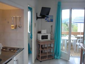 Kuchyň nebo kuchyňský kout v ubytování Residence Motel Corsicana
