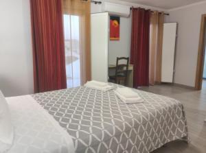 Katil atau katil-katil dalam bilik di Casa da Aldeia +13 gambar