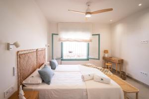 En eller flere senge i et værelse på Villa Taray + 90 billeder