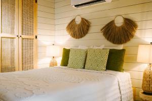 Letto o letti in una camera di Tranquilseas Eco Lodge & Dive Center