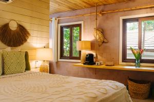 Letto o letti in una camera di Tranquilseas Eco Lodge & Dive Center