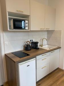 A cozinha ou kitchenette de Appartement vue Port