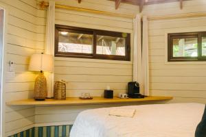 Letto o letti in una camera di Tranquilseas Eco Lodge & Dive Center