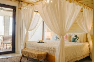 Letto o letti in una camera di Tranquilseas Eco Lodge & Dive Center