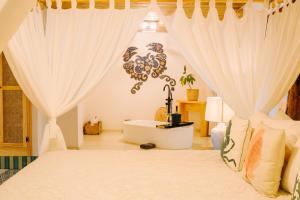 Letto o letti in una camera di Tranquilseas Eco Lodge & Dive Center