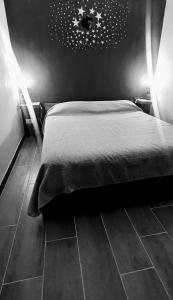 Letto o letti in una camera di Tiny Beautiful Thing Ragusa