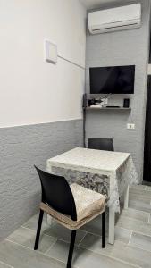TV o dispositivi per l'intrattenimento presso Tiny Beautiful Thing Ragusa
