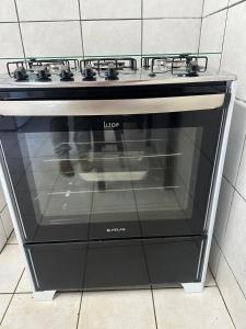 Kuchyň nebo kuchyňský kout v ubytování Casa no Lago dos Encantos