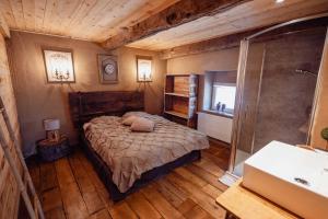 Postel nebo postele na pokoji v ubytování Les Gîtes de Sprimont - Le Cosy