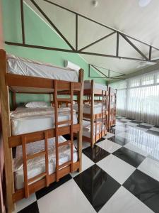 Hotel Mi Linda Tierra客房内的一张或多张床位