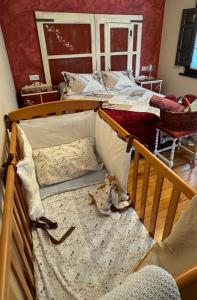 A bed or beds in a room at Casa Joglar