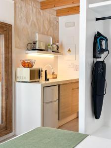 Kuchyň nebo kuchyňský kout v ubytování Moona Hostal Altea