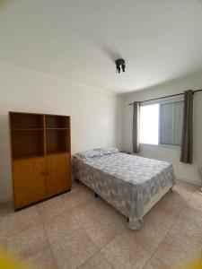 Ένα ή περισσότερα κρεβάτια σε δωμάτιο στο Ap duplex na Paraguassu com garagem e churrasqueira +20 φωτογραφίες