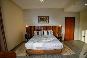 Postel nebo postele na pokoji v ubytování Hotel Arabesque + 37 fotografií