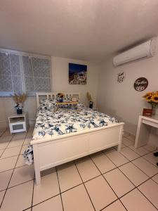 Postel nebo postele na pokoji v ubytování Cozy in Cabo1
