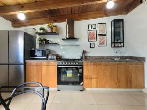 Kuchyň nebo kuchyňský kout v ubytování Hotel Olimpo