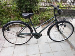 在private rooms in togo beach and park side house内部或周边骑自行车
