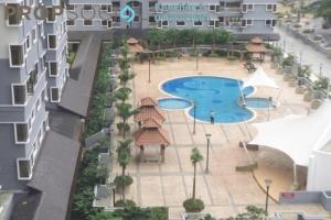 an overhead view of a swimming pool in a building at SS GREY HOMESTAY Pelangi Utama in Petaling Jaya