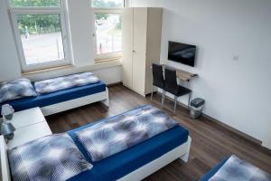 Μια τηλεόραση ή/και κέντρο ψυχαγωγίας στο SKY Apartments Hannover